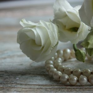 pearls and white roses